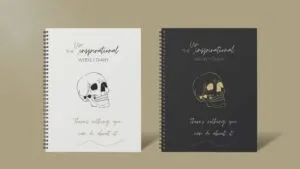 The Uninspirational Weekly Diary mock up images light and dark skull cover "There's nothing you can do about it"