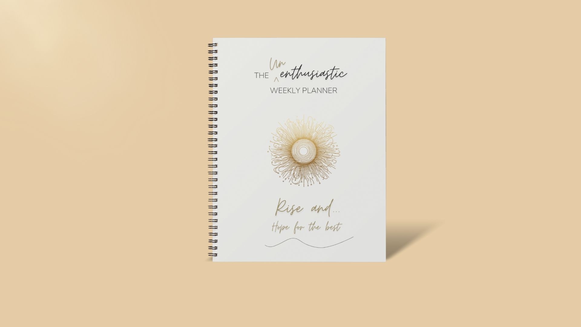 Unenthusiastic Weekly Planner mock up image of coil bound weekly planner on orange background. sun cover.